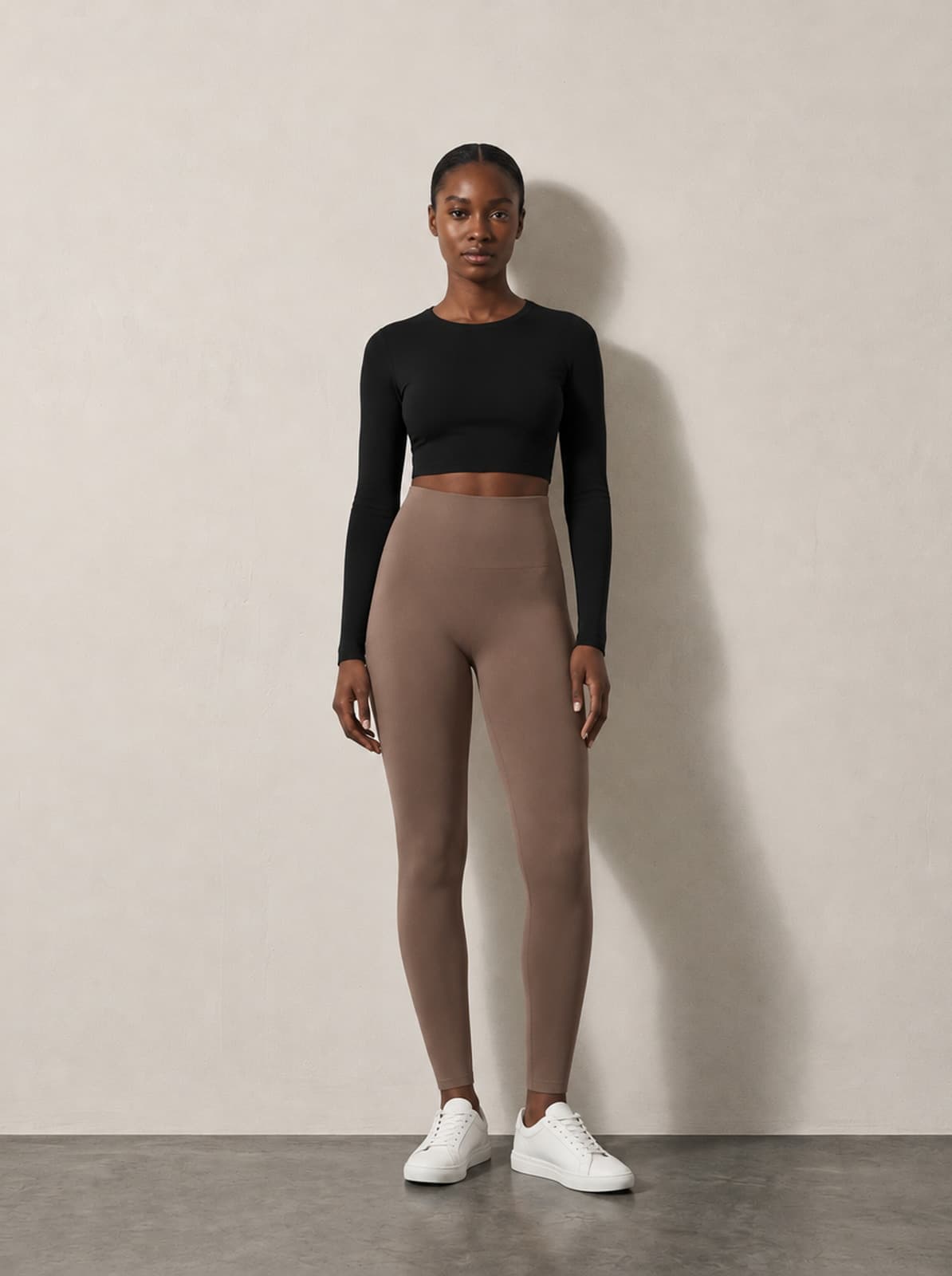 Baseline Seamless Legging in clay, worn front on with a cropped long-sleeve top