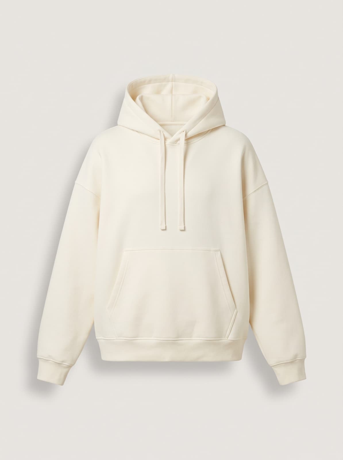 The Chelsea Pullover in cream, photographed flat against a plain backdrop
