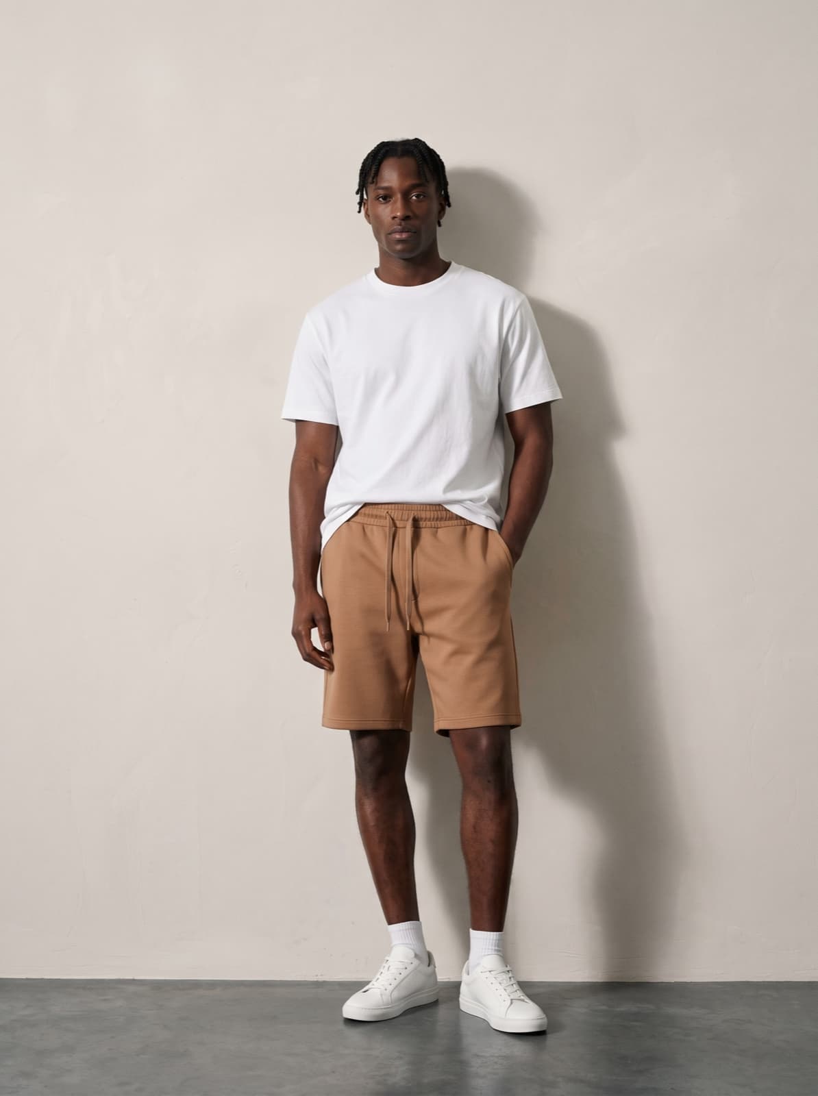Chelsea Shorts in tan worn with a plain white tee