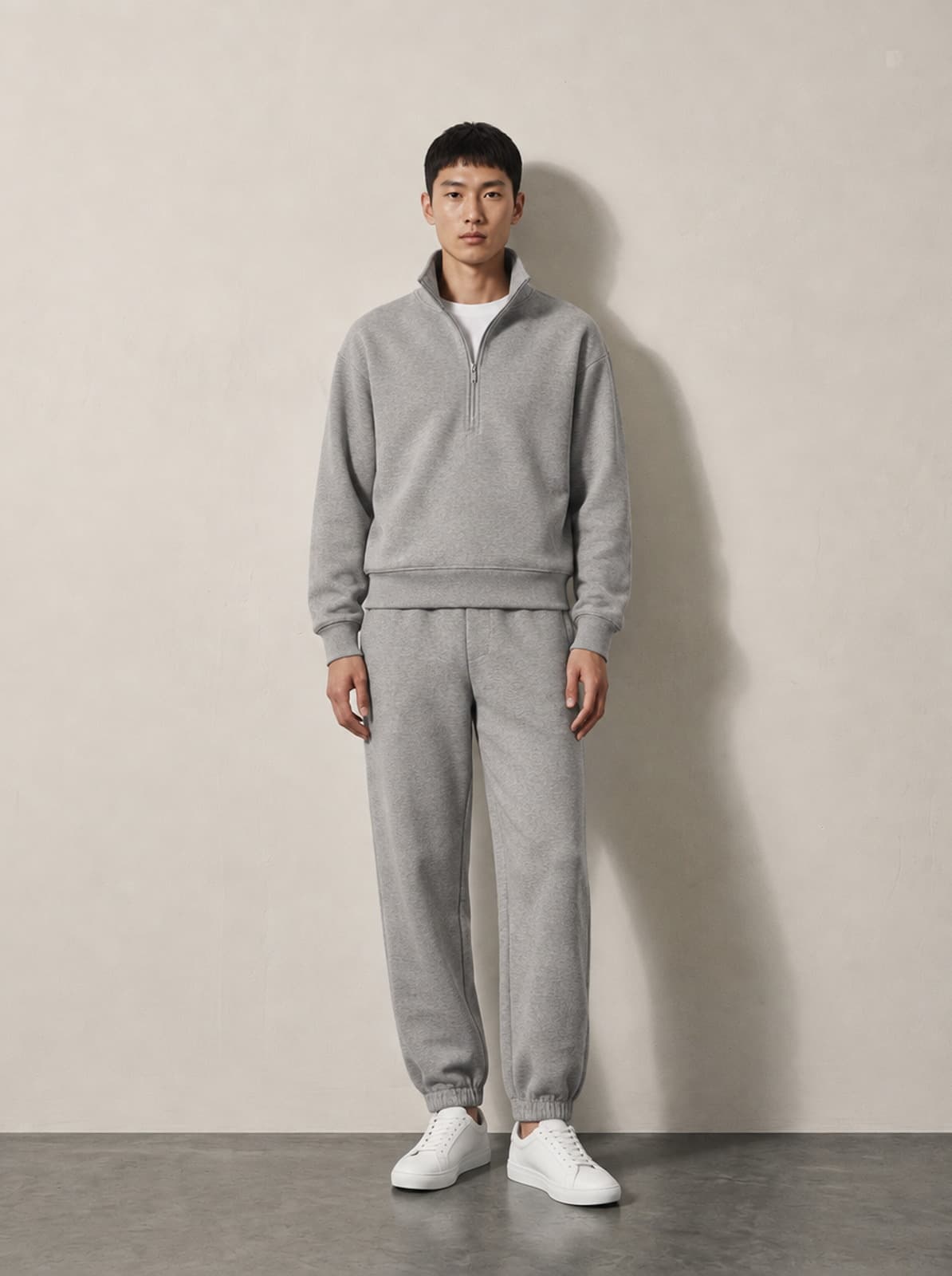 Holland Park Tracksuit in ash worn as a full set, showing the tapered leg and elasticated cuff