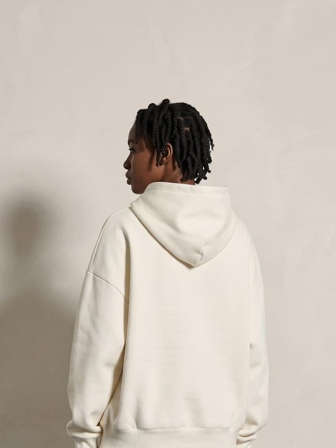 Back of the Kensington Pullover Hoodie in cream showing the hood and the clean back panel